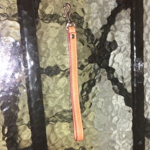 Dooney and Bourke Wristler strap brown